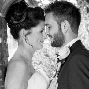 Romantic close-up pose of the newlyweds touching heads at their Dorton House wedding 