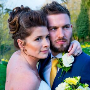 A close up portrait of the newlyweds in the gardens of Dorton House 