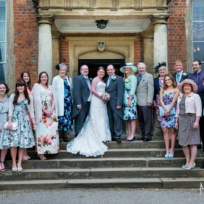 Dorton House wedding photography - group pose on the steps to this grand building
