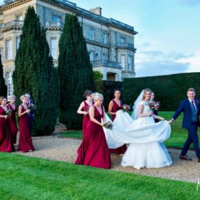 The bridal party take a stroll in the grounds on this gorgeous sunny day