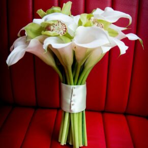 Kings Chapel Amersham wedding photography - white flowers on the leather car seats
