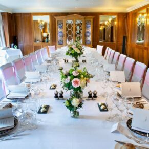 Long wedding banqueting table setup at Le Manoir Aux Quat Saisons in Oxfordshire