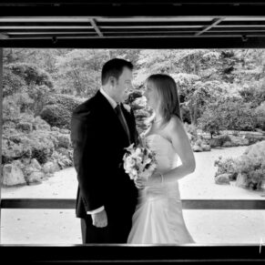 The newlyweds captured in the Japanese garden pavilion at Le Manoir Aux Quat Saisons 