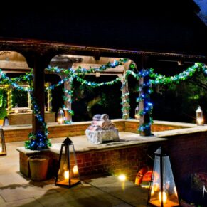 The Dairy's pavilions captured at dusk with candles and warm blankets for the guests on this autumnal evening