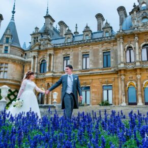 A visit to Waddesdon Manor with the newlyweds produced this striking shot of them walking through a landscape of blue flowers under a gorgeous blue sky 