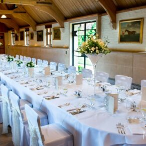 The interior of the West Hall setup for a glorious banqueting table wedding breakfast