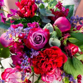 Five Arrows Waddesdon wedding photography of tis stunning red bridal bouquet