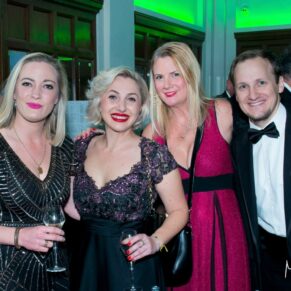 Buckinghamshire events photography of some delegates at a black tie drinks reception 