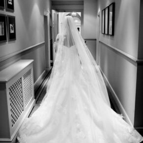 Wokefield Estate Berkshire Wedding Photography - dramatic black and white pose of the bride in the historic entrance area