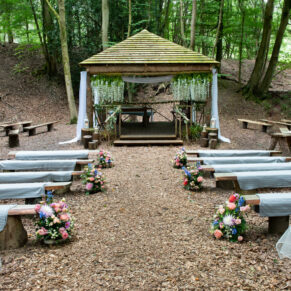 The stunning woodland ceremony setup in the dell before the guests arrive