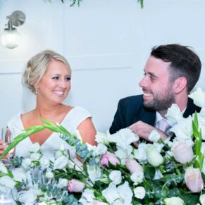 The bride and groom captured during the speeches at The Grange, Northwood 