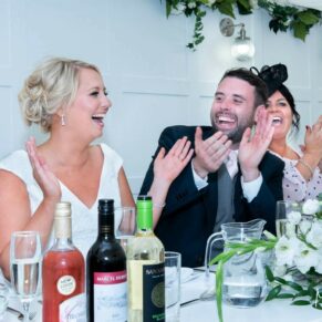 The newlyweds reactions captured during the speeches at The Grange, Northwood 