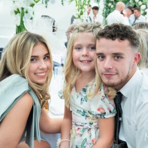 Three wedding guests captured during the meal at The Grange, Northwood 