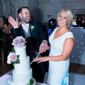 Wedding cake cutting captured at The Grange, Northwood 