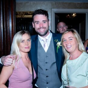 The groom with two friends captured at The Grange, Northwood wedding 