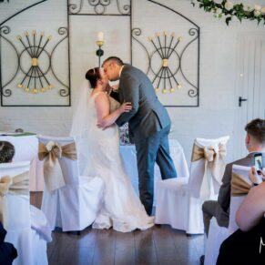 Five Arrows Hotel wedding photography of the first kiss