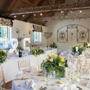 Stable interiors just before the wedding breakfast was served - the attention to detail in this capture is stunning   