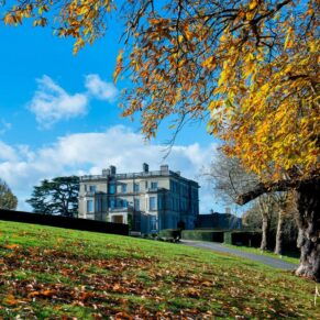 Hedsor House exterior on a gorgeous autumnal day with golden leaves everywhere