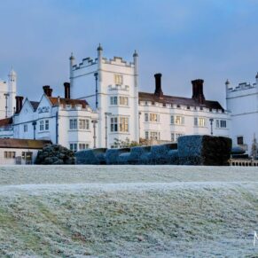 Danesfield House captured across the lawns on a frosty wedding December morning in the Chilterns
