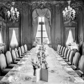Cliveden House interior of the French Dining Room's long banqueting table all setup for the wedding breakfast 
