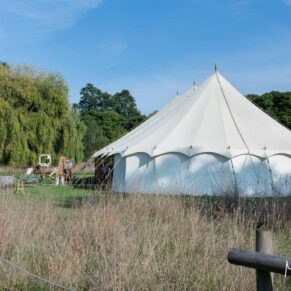 Magical summer meadow setting for the marquee at this Old Windsor celebration