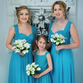 Bridesmaids photography with lovely window lighting captured before the wedding ceremony in the grand historic entrance hall at the Beaumont Estate    