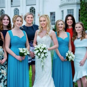 Bridal party photography in front of the Beaumont Estate White House at this relaxed summer wedding