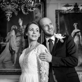 Buckinghamshire black and white wedding photography of the newlyweds posing for the camera after their marriage ceremony