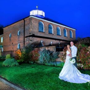 The newlyweds captured at dusk with a little help from my floodlighting in front of the Kings Chapel in Old Amersham 