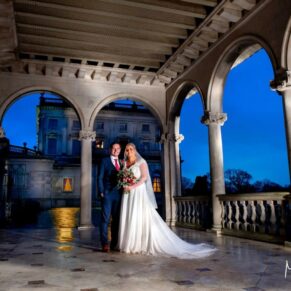 The newlyweds captured at dusk with dramatic lighting in the Cockerell Pavilion at Cliveden House on their wedding day