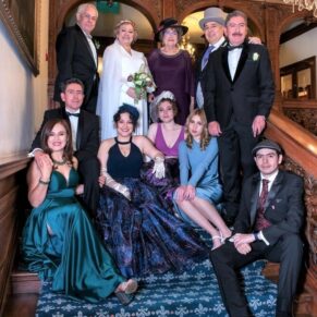 Group pose on the grand internal staircase at this historic hotel 