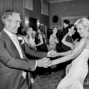 The newlyweds going for it on the dancefloor with some wild moves at their Hartwell House wedding 