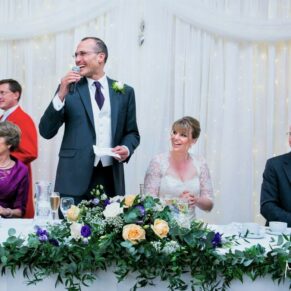 The groom's lively speech in progress captured during his Latimer Estate wedding 
