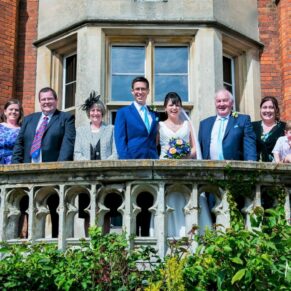 Some of the wedding guests captured on the garden terrace of the Latimer Estate 