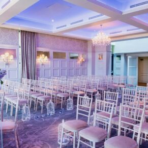 The indoor ceremony room setup with gorgeous lighting effects illuminating the interiors at the Latimer Estate 
