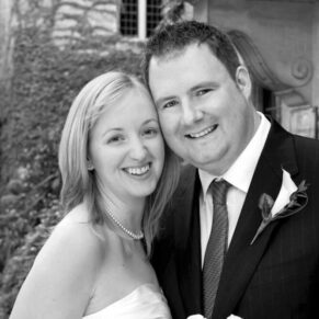 The newlyweds pose for my camera in this black and white capture at Le Manoir Aux Quat Saisons 
