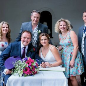 Micklefield Hall Wedding Photography - signing of the the register with the witnesses 
