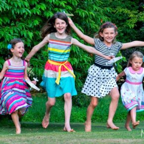 These young girls really thought they could fly as they buzzed around at this fun wedding  