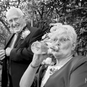 Who said you need a glass to drink wine during the drinks reception  