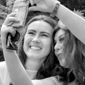 Same Sex Buckinghamshire Wedding Photography - selfie time for the bride with her friend
