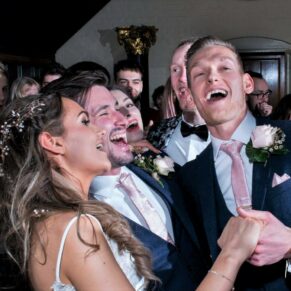 The energetic newlyweds captured dancing the night away with their friends at The Dairy on the Waddesdon Estate 