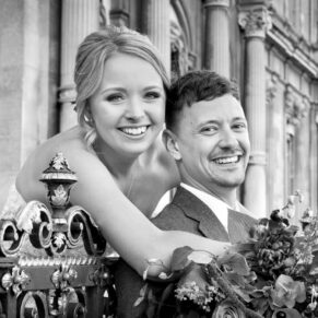 The newlyweds enjoy a hug at the manor before returning to their reception back at The Dairy on the Waddesdon Estate