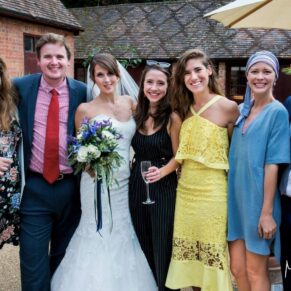 Five Arrows Hotel - Buckinghamshire Wedding Photographer - the bride poses for a photo with some of her friends