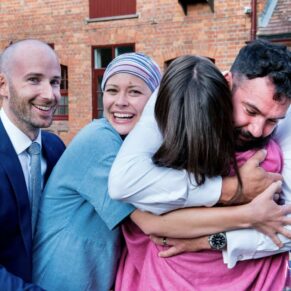 Five Arrows Hotel - Buckinghamshire Wedding Photographer - hugs were the order of the day at this informal marriage celebration