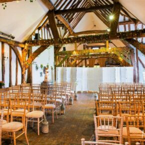Old Luxters Wedding Photography - the ceremony setup inside the barn