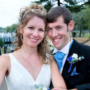 Runnymede Hotel Wedding Photography - the newlyweds pose for the camera 