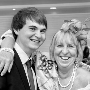 Runnymede Hotel Wedding Photography - two of the guests enjoying the party vibe