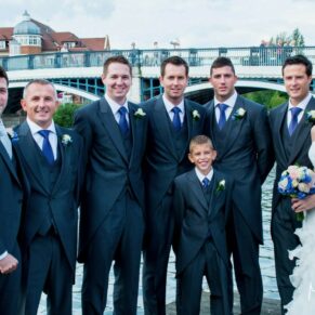 Sir Christopher Wren Hotel Wedding Photography - the lads pose for the camera beside the River Thames