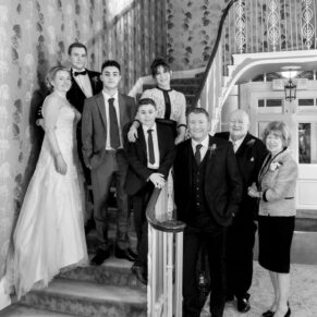 Group pose on the hotel staircase at Saint Michael's Manor 