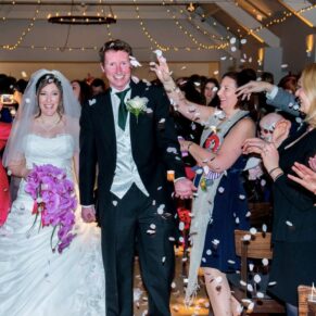 Stoke Place wedding photography - the newlyweds exit the civil ceremony